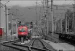 1216 023 (E190 023) ist mit der Rola im Terminal Wrgl angekommen. Nach dem abkuppeln der Lok, kann das Entladen beginnen. (04.07.2008)
