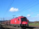 1216 145(part of the best) ist mit einem Selbstentladewagen-Güterzug bei Redl-Zipf unterwegs;091105