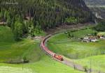 An OBB class 1216 (E190) heads north past St Jodok whilst working Euro City 88, 0904 Verona P.N-Munich, 23 May 2013