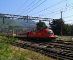 1216 018-2 mit EC 81  DB-ÖBB EuroCity  (München Hbf - Bologna C.le) am 1.9.2015 bei der Abfahrt in Bolzano/Bozen.