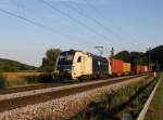 Die 1216 950 mit einem Containerzug am 15.08.2013 unterwegs bei Einöd.