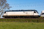 1216 960-5 mit einem Autozug bei Bramstedt. 28.4.26