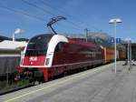Gterzug mit Lok 1216 940-7 der Salzburger Lokalbahnen.Haltestelle Vigaun Richtung Sden am 30.5.2011 um 11 Uhr 05 