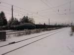 1216 der Adria Transport mit einem Leerzug gebildet aus Hochbordbordwgen bei einem Signalhalt in Korneuburg, sterreich in Fahrtrichtung Stockerau am 12.2.2013 gegen 16:20 Uhr
