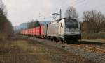 1216 955-5 mit Containerzug in Fahrtrichtung Norden. Aufgenommen am 25.03.2014 beim BÜ Eltmannshausen/Oberhone.