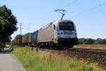 Der schmutzige Roland, 1216 955 der WLC, bespannte am 23.07.2014 einen Containerzug in Fahrtrichtung Norden. Aufgenommen bei Eystrup.