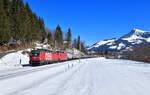 1293 045 + 1116 100 mit einem Güterzug am 12.02.2022 bei Klausen.