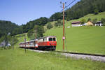 Am 29. Juni 2010 hat 1099.02 mit dem R 6813  Ötscherland  soeben den Bahhof Laubenbachmühle verlassen und erkämpft sich die Steigung der Bergstrecke.