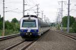 4020 301 und 4020 261 fahren als Regio-S-Bahn S8 vom Flughafen Wien(VIE) nach Wien Sdbahnhof(Ost).