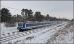 4020 232 und 4020 270 als SB 23588 (Mdling - Gnserndorf), aufgenommen am 12.02.2013 kurz vor der Hst.