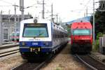 Klassische Zugbegegnung in Wien-Matzleinsdorfer Platz. Eine 4020 der S1 von Mödling nach Payerbach-Reichenau fährt auf Bahnsteig 2 ein, ein Dosto-Wendezug, gezogen von 1116-149 nach Wr.Neustadt verlässt die Station in Richtung Wien-Meidling.Gut zu erkennen: das alte ÖBB-Logo, genannt  Pflatsch .