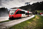 4024 112-7 fährt als S1 4222 (Sillian - Friesach), in die Haltestelle Berg im Drautal ein.