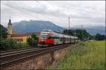 Ein Innsbrucker 4024er strebt vor dem Kaiser Gebirge als RB 5120 (R 5120) von tztal nach Rosenheim. (04.07.2008)