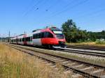 4024 055-8 ist bei Redl-Zipf als R3010 Richtung Salzburg unterwegs; 120718