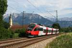 4024 072 am 10.07.10 bei Niederaudorf. Gru an den Tf, welcher seinen Fhrerstand mit einer Deutschland Flagge schmckte und sich wohl schon auf das letzte WM Spiel der Deutschen am Abend freute.