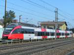 4024 107-7(BahnStore Hallein) verlsst mit Zugleistung R3012  Bhf. Marchtrenk;110303