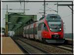 Triebwagen 4024 051 am 21.7.2006 bei der Einfahrt in die Haltestelle Wien-Praterkai als S 80 auf dem Weg nach Wien Sd-Ost.