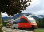 4024 124-2 als R 4260 (Lienz - Friesach) am 24.9.2015 bei der Abfahrt in Berg im Drautal.