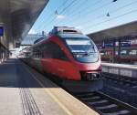 4024 124-4 als S1 4223 (Friesach - Lienz) am 11.2.2016 bei der Abfahrt in Klagenfurt Hbf.