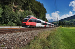 4024 063-2 fährt als S3 5060 (Salzburg Liefering - Schwarzach-St. Veit) bei Mitterberghütten vorüber.
Aufgenommen am 7.8.2016.