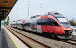 Der 4124 023-5 wartet am 28.08.2019 im Bahnhof Wulkaprodersdorf auf den nächsten Einsatz.