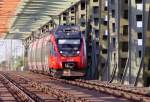 4124 014 als S80 bei der Fahrt ber die Ostbahnbrcke nach Wien Sdbahnhof(Ost).