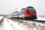 4124 013 als REX2817  Blaufrnkischland  wird in Krze den Zugendbahnhof Deutschkreutz erreichen, 22.01.2010.