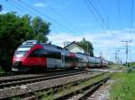 4124 036-7 auf der Ostbahn bei km 39,7 als REX7815;100809