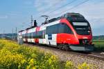 4124 030 ist mit S-Bahn 21019 von St. Plten nach Wien Franz Josef's Bahnhof unterwegs. Die Aufnahme entstand am 12.05.2012, kurz vor Tulln Stadt.