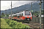 Ein moderner ET 4746.523 der ÖBB erreicht hier aus Hochfilzen kommend am 28.5.2022 um9.26 Uhr den Ortsrand von St. Johann in Tirol.