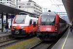 FELDKIRCH (Vorarlberg), 25.04.2025, zweimal ÖBB im Bahnhof Feldkirch: links 4748 006-5 als REX1 nach Schruns, rechts 80-90.751 als RJX 660 nach Bregenz