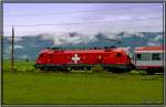 EM Lok 1116 075 mit Schweizer Design fhrt mit Zug IC 539 von Wien nach Villach.