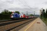 Die 1116 033  EM Frankreich  durcheilt mit ihrem Zug  am 18.05.08 den Bahnhof Bheimkirchen.
