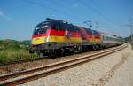 1116 036  EM Deutschland  vor OEBB Intercity 740  Universitaet Salzburg  , fotografiert an einem sehr heiszen Junitag kurz nach Unter Oberndorf. Das Foto ist am 22.06.2008 entstanden.