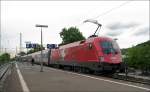 1116 075-1(EM-Lok  Schweiz )mit EC 112 am 28.04.09 bei der ausfahrt in Bensheim.