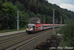 Im letzten Licht des Tages kam die erwartete 1116 246-8 mit BB EC 110 Klagenfurt Hbf. - Mnchen Hbf. durch Loifarn  gestrmt  (sterreichurlaub 11.08.09)