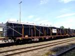 Rns-z (31813991445-7) steht mit zwei weiteren Rns-z, incl. den beidseitigen Ks-Schutzwagen am Bahnhof Ried i.I. mit WIEHAG-Leimbindern beladen, zur Reise nach Rum�nien bereit;110617