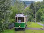 Graz. Am 26.06.2020 öffnete das Tramway Museum Graz das erste Mal seine Pforten für Besucher. TW 121+60B waren als Shuttle vom Jakominiplatz nach Mariatrost zum Öffnungstag im Museum unterwegs, hier bei Rettenbach.