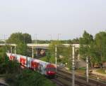 Dosto-Zug mit einem REX kurz nach der Ausfahrt aus Wien Heiligenstadt, 30.4.10