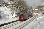 BB 80-90 702 mit RJ 63 (Mnchen - Budapest) im Wiener Wald bei Eichgraben-Altlengbach, 01.02.2009
