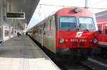 Steuerwagen 8073 219-2 wartet als Regionalzug auf die Abfahrt nach Rosenheim.