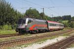 1116 035 mit einer der drei Railjet-Versuchslackierungen zog am 16.07.2007 den BB-EC Transalpin durch den Bahnhof Hallwang-Elixhausen.