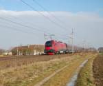 Railjet 63 in voller Fahrt am 27.12.2008
bei Oftering. Die Schiebelok der hinteren
Garnitur war die 1116 208.