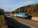 Die 1016 023 mit einem REX nach Passau am 12.01.2014 unterwegs bei Wernstein.