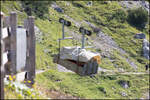 Und dann geht´s los ,.. Ab ins Tal mit einer Ladung f�hrt die Gondel der Materialseilbahn zur S�dwandh�tte . 28.07.2026  