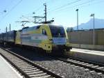 Dispolok ES 64U2-033 mit Containerzug kommend aus Httau unterwegs zum Containerbahnhof Salzburg-Liefering. 20.08.08