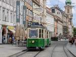 Graz. TW 206+319B war am 15.08.2020 als Sommerbim unterwegs, hier beim Hauptplatz.