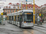 Graz. Am 06.12.2020 war in Graz  E-Tag . Auf mehreren Strecken waren Einschubkurse unterwegs zu Corona-Massenteststationen. Variobahn 220 konnte ich als E am Jakominiplatz in Fahrtrichtung Laudongasse ablichten.