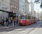 Wien Wiener Linien SL 67 (E2 4065) X, Favoriten, Quellenstraße / Favoritenstraße am 21. Oktober 2010. - Scan eines Farbnegativs. Film: Fuji S-200. Kamera: Leica C2.