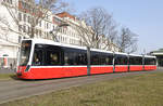 Wiener Linien Type  D  Triebwagen 313 war am 23.02.2021 auf der Linie 6 unterwegs und wurde von mir unweit der Station Margaretengürtel fotografiert, im Hintergrund zu sehen ist die
